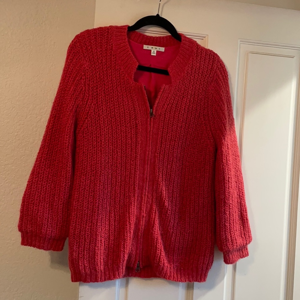 Bright coral mohair and wool sweater.